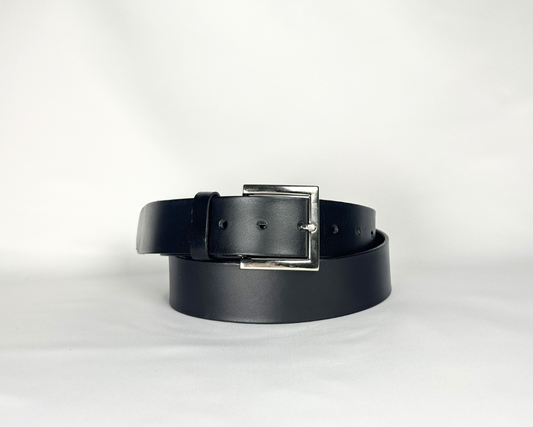 Black belt with a silver buckle on a white background