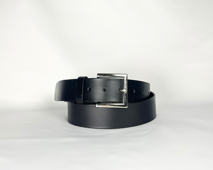 Black belt with a silver buckle on a white background
